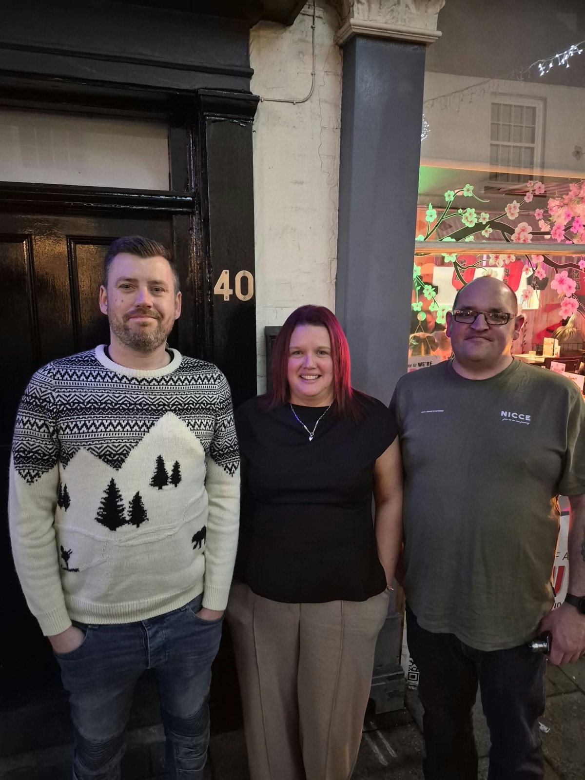 The Sam's Service and Repair team outside on the high street
